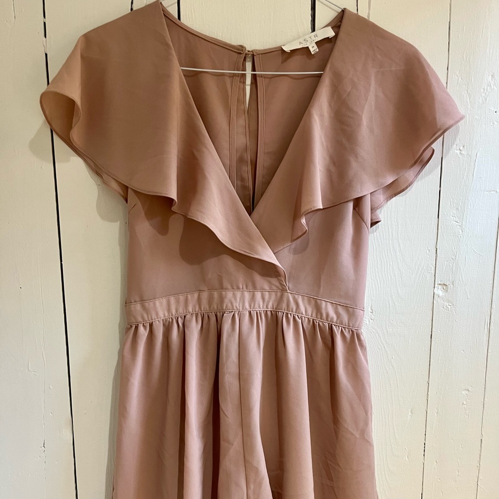 Blush pink ruffled romper